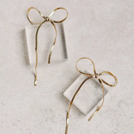 MAXI GOLD BOW DUSTER EARRINGS